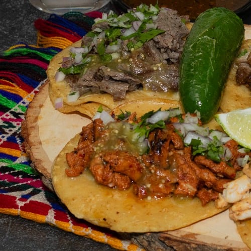 (2) soft tacos w/rice and beans.